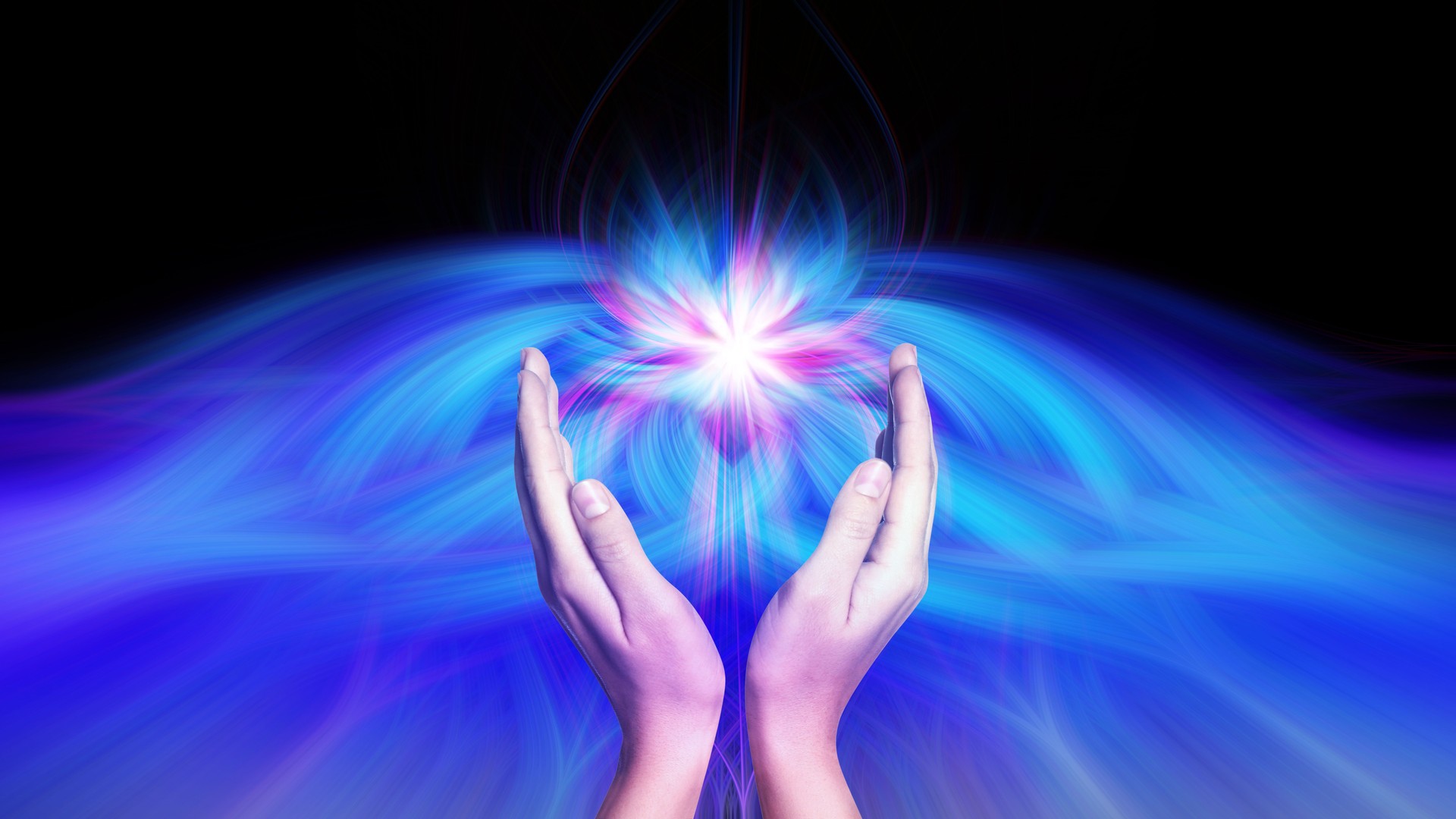 Aura phenomena. Woman with flows of energy making beautiful pattern between her hands against black background, closeup Aura phenomena. Woman with flows of energy making beautiful pattern between her hands against black background, closeup